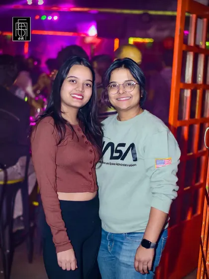 Guests posing for a photo at Shift HSR. It's a great place to hang out with friends.