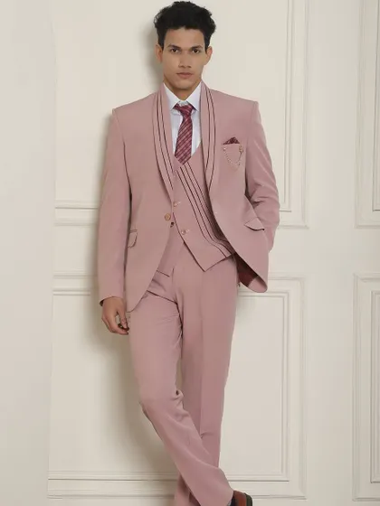 Another take on the pastel suit, this one featuring unique lapel detailing for a distinctive look.
