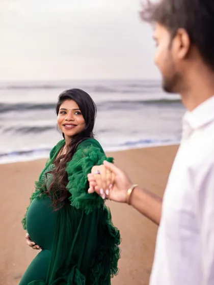 A creative "follow me" shot that tells a story of leading the way into a new chapter of life together.