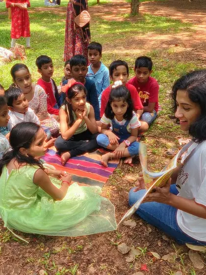 A fantastic series from our reading of 'Handa's Surprise'. My animated storytelling style is on full display, as are the delighted and curious faces of the children.