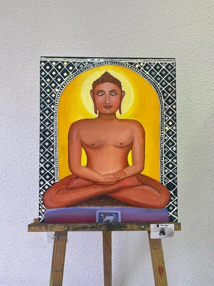 "Live and let live." A full view of the Mahavir Swami artwork on an easel. This piece combines acrylic painting with Lippan and Mandala art, a fusion I love to explore in my spiritual commissions.