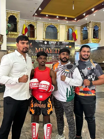 Standing proud with my fighters. We are a team built on respect and a shared goal of becoming the best.