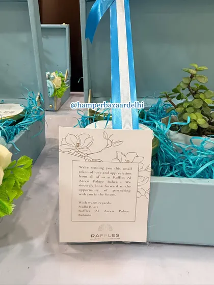 It's all in the details. For the Raffles Hotel corporate order, we attached a beautifully printed custom note to each hamper, conveying a message of appreciation and partnership from our client.