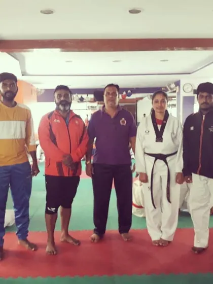 Learning together as a team. Our coaches and senior members after completing a kyorugi seminar focused on advanced sparring tactics, ensuring our competitive edge.