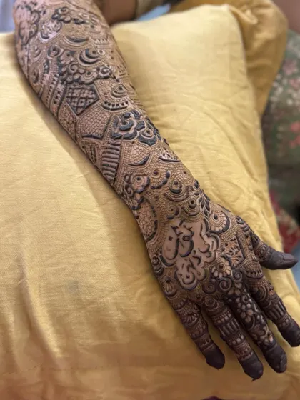 This is a detailed view of my intricate bridal henna work. Each design is unique, combining traditional patterns like paisleys and mandalas with fine-line fillers to create a stunning, full-coverage look for your special day.