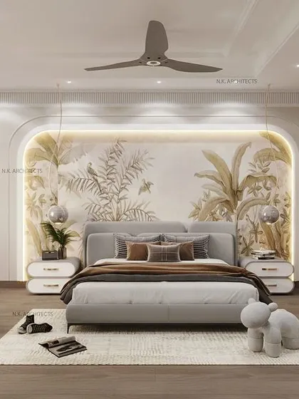 Here, we've used a beautiful wallpaper mural within an arched niche to create a stunning focal point behind the bed. The design is clean and minimalist, with curved wardrobe doors that echo the arch theme, creating a symphony of luxury.