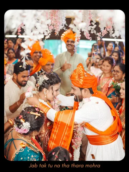 A candid moment of the groom embracing his bride during the ceremony, surrounded by loved ones. These unscripted displays of affection are the heart of my wedding photography.