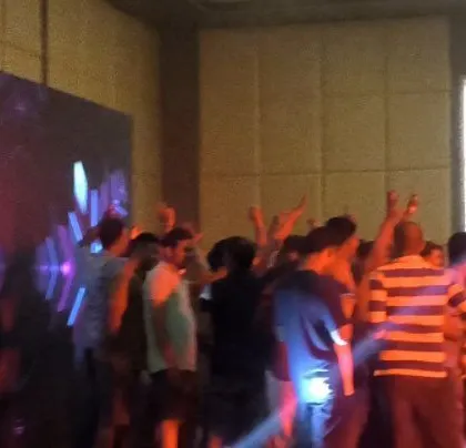 The LED screen provides a dynamic visual backdrop for the Sriram Properties event.