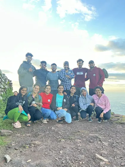 Posing at a viewpoint during the golden hour.