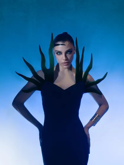 Exploring avant-garde concepts with dramatic lighting. This futuristic look shows my ability to create striking, high-fashion visuals for a model's book, pushing creative boundaries to produce something truly unique.