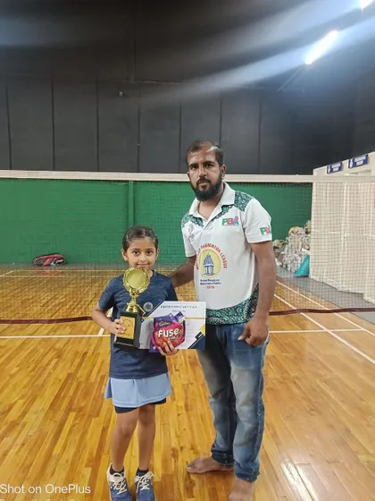 Another proud moment captured between our student Aadhya and her coach.