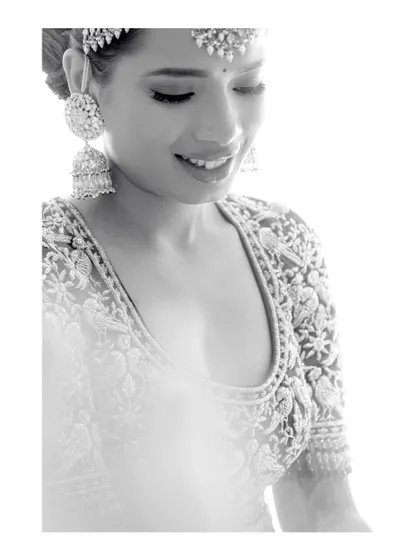 A timeless black and white bridal portrait, emphasizing emotion and light.