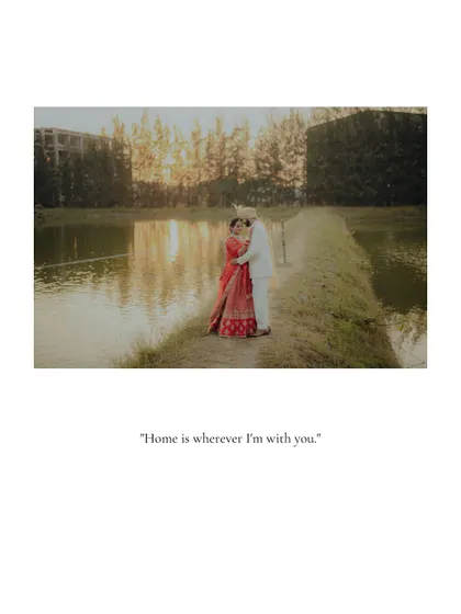 Home is wherever I'm with you. A wide shot of the couple embracing in a serene, natural landscape, perfectly capturing this sentiment.
