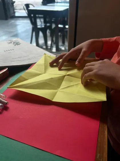 The creases on this paper tell a story of exploration and discovery. Each fold is a step in a logical process, a hands-on lesson in geometry and spatial reasoning. This is learning that you can literally feel.