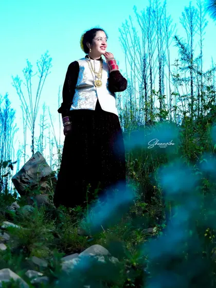 A wide-angle shot showing the bride in her natural environment. This style of environmental portraiture tells a story about the person and the place.