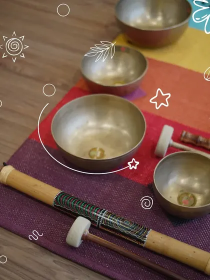 A close up of the tools of tranquility. This image showcases the beautiful, handcrafted Tibetan singing bowls and mallets used to create healing vibrations in our sound baths.