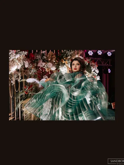A motion shot capturing the beautiful flow and structure of the bride's reception saree. A true work of art in motion.