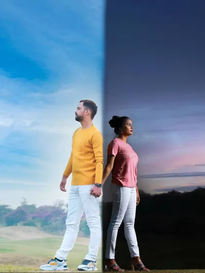 A creative day-and-night concept shot in Gurugram. This composite image showcases the couple against both a bright blue sky and a dramatic sunset, symbolizing their journey together through all times.
