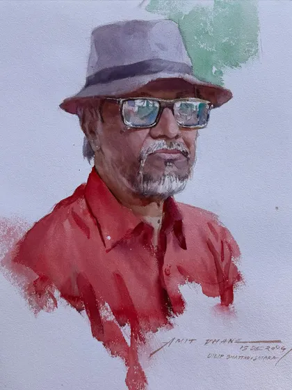 The finished watercolour portrait from the Kalakari festival. The model's hat and glasses added great character to the painting.