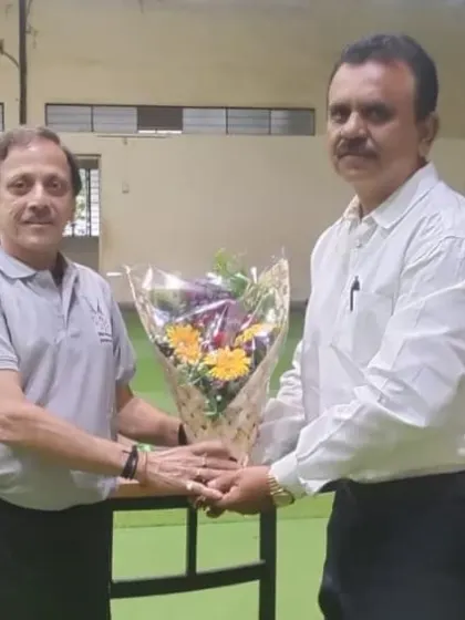 We honored the father of Om Bhosale, one of our successful players, at the meeting. He shared his experiences with the academy and credited our facilities and coaching for his son's success, inspiring other parents.
