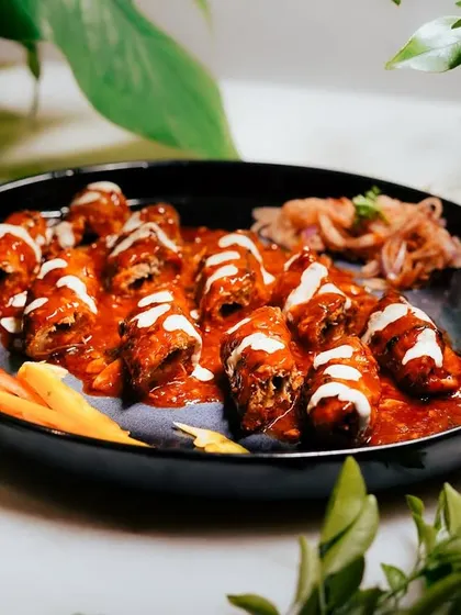 This is my Mutton Barra Seekh, featuring tender mutton pieces slow-cooked and drenched in a savory gravy, then drizzled with cream. It’s a rich and decadent dish perfect for special occasions.