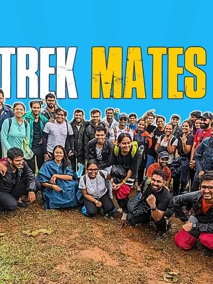 A graphic celebrating our "Trek Mates" with a photo of a group that has conquered a peak together.