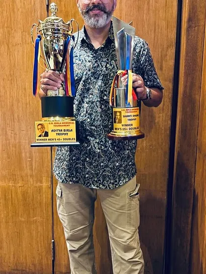 I lead by example, bringing my experience from the competitive circuit directly to you. Here I am after securing a double crown in the Men's Doubles 45+ and Men's Combination 85+ at the GD Birla Championship.