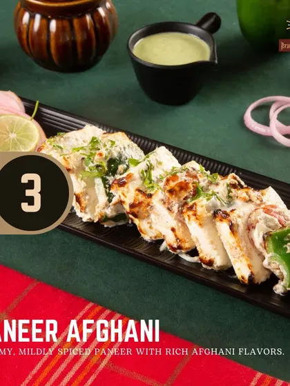 For our vegetarian guests, the Paneer Afghani offers creamy, mildly spiced paneer with rich Afghani flavors, grilled until soft and lightly charred.