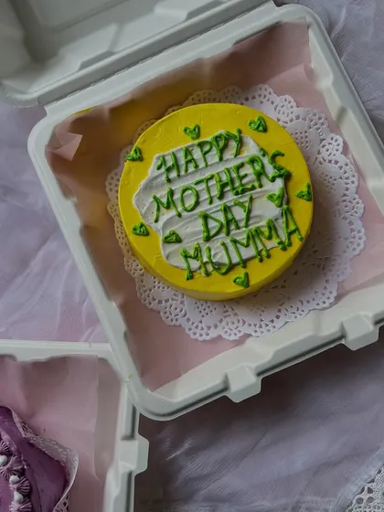 A cheerful yellow bento cake to brighten her day. I love creating these custom mini cakes to help you share personal messages with your loved ones.
