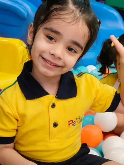 A peace sign and a happy grin. This student is clearly having a fantastic time during their school picnic with us.