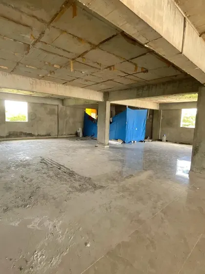 An initial walkthrough of the empty commercial floor. At this stage, I focus on the natural light sources, the structural elements, and the overall volume of the space to plan the customer flow and layout for the new home furnishing store.