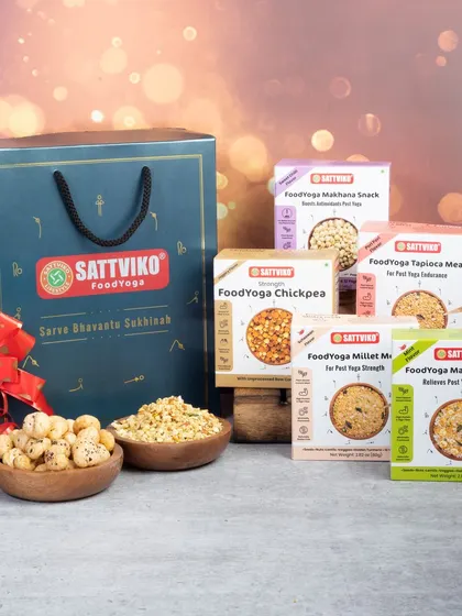 This image is styled as a complete gift hamper, making it easy for customers to see the product as a perfect festive present. The bokeh background adds a touch of celebration and magic.
