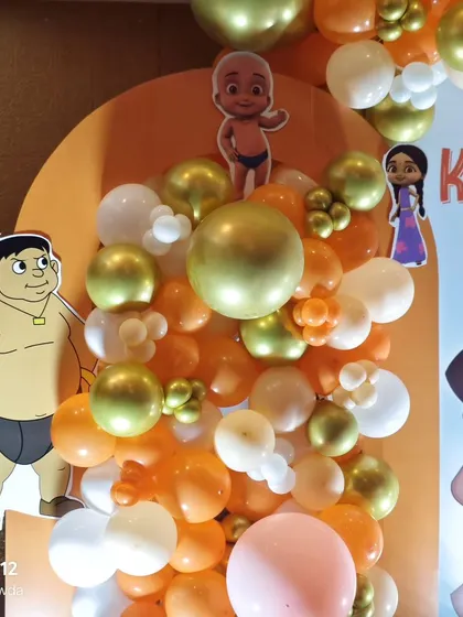 A fun balloon arrangement featuring character cutout's from Chota Bheem.