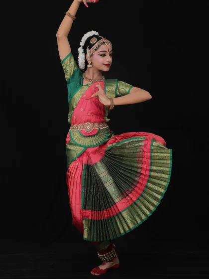 Tanmayi, back in the studio after her 10th-grade exams. This photo captures her poise and the elegant lines she has developed through years of dedicated Bharatanatyam training.