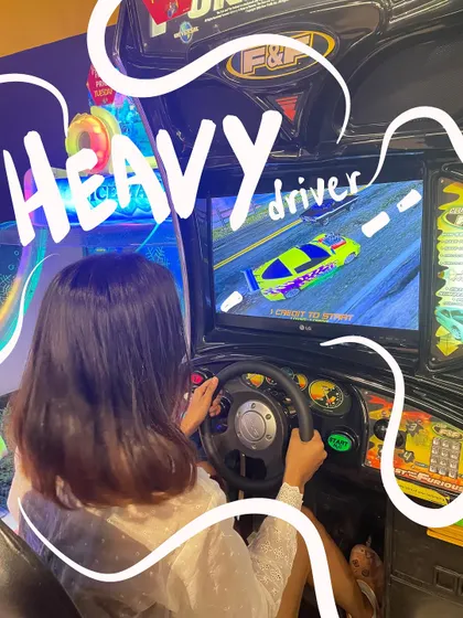 Presenting Vaish-core: heavy driver edition. A fun photo from the arcade, with doodles that add to the playful, competitive vibe.