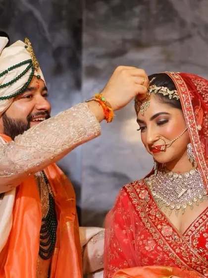 The sindoor moment for my beautiful bride Nitya. The groom's happy smile makes it even more special.