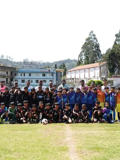 A group photo with all the teams that participated in the friendly matches in Ooty.