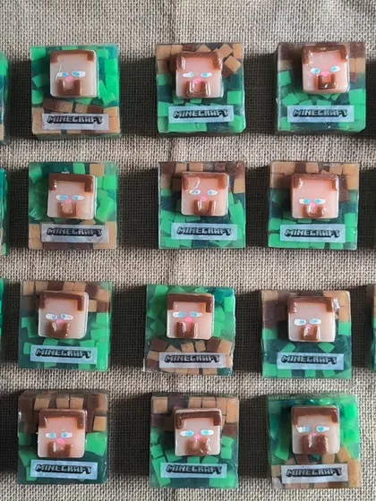 Building fun with Minecraft themed soaps. These goat milk soaps are designed with the iconic pixelated look, making them a huge hit with young gamers.