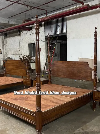 Another shot of the four-poster beds in my workshop, ready for delivery. The consistent quality across multiple units is a hallmark of my work.