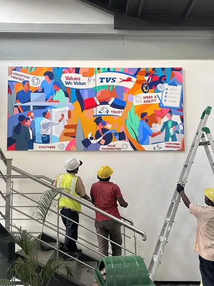 We collaborated with TVS Motor Company on an interactive mural where their employees helped paint the company's vision and values. This piece is a true representation of teamwork and corporate pride.