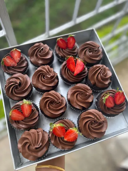 My chocolate cupcakes get a fresh upgrade with the addition of sliced strawberries.