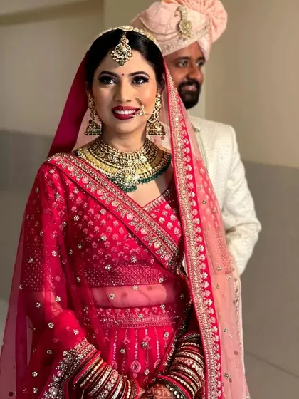 A happy couple on their big day. The bride is wearing one of my classic gold and green Kundan sets, looking absolutely beautiful.