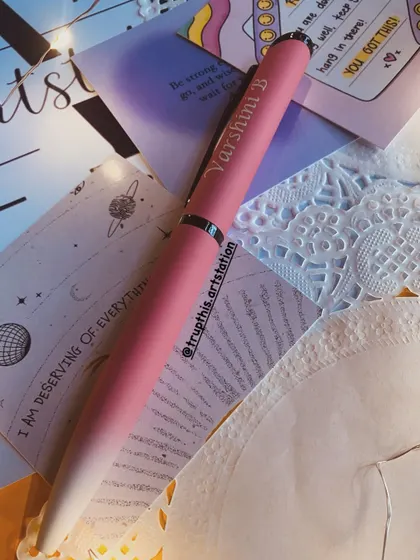 I also offer budget-friendly custom items like this personalized pen. This one features a pink-to-white gradient and is engraved with the name "Varshini B," making for a simple yet thoughtful gift.