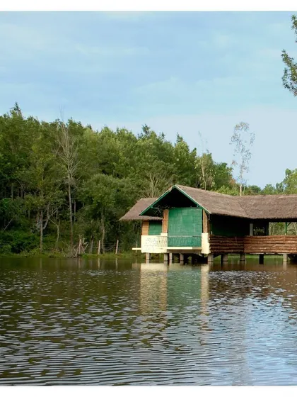 A tranquil pavilion on the water at Gorukana Resort. This space provides a serene spot for guests to connect with the peaceful surroundings and enjoy the beauty of the lake.