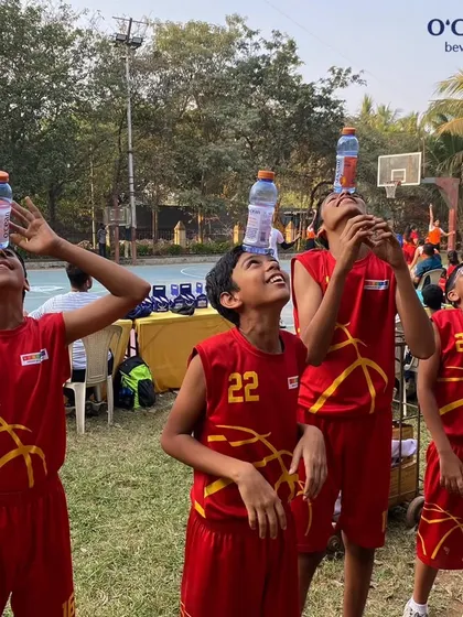 It's not all serious drills. Here are some of our younger players having fun with a bottle balancing challenge during a break at the MVP Skills Challenge. We believe in having fun while we work hard.