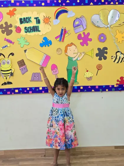 Arms up in excitement for the new school year. We love seeing this enthusiasm in our students.