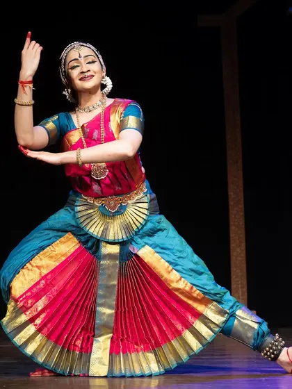 A dynamic 'aramandi' stance from the Kanasu festival, capturing the energy and vibrancy of a pure dance sequence.