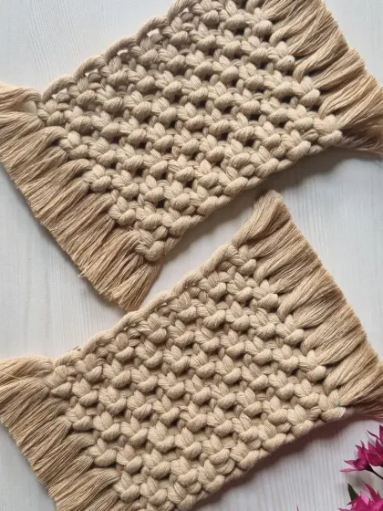 This pair of beige rectangular coasters offers a neutral, calming aesthetic that fits with any decor.
