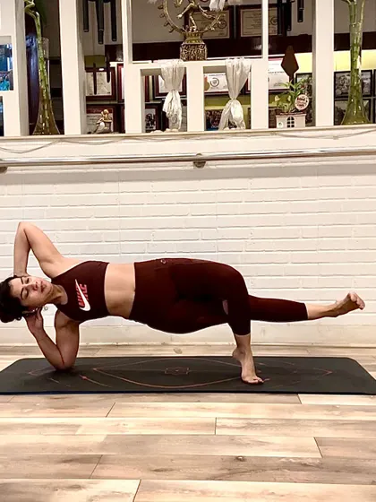 This side plank variation is a fantastic exercise for strengthening the obliques and improving balance. By keeping my core engaged and body in a straight line, I am building the internal strength that Pilates is known for. It is about control and intention in every movement.