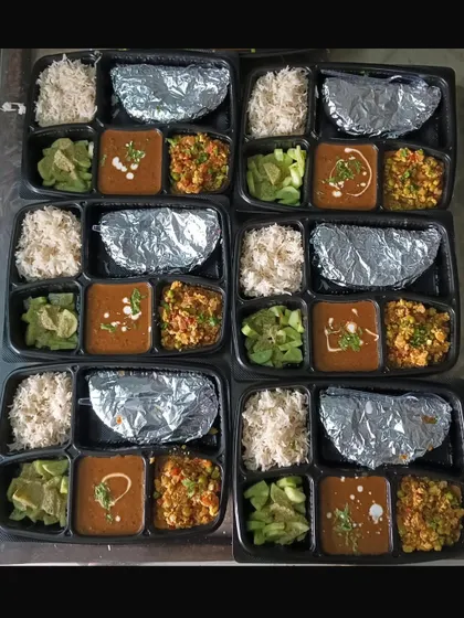 A large order of our paneer bhurji and dal makhni thalis. It's a pleasure to cook for so many people and see them enjoy my food.